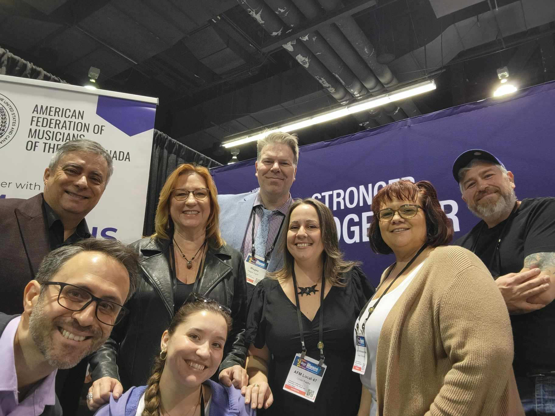 A couple of NAMM attendees (pictured below, left) stopped for a quick pic with AFM Local 7 President Edmund Velasco and Secretary/Treasurer Tammy Noreyko, AFM Director of Freelance Services Wages Argott, AFM Local 47 Live Performance Business Representative Amber O’Donnell and Director of Organizing Ed Gutierrez.